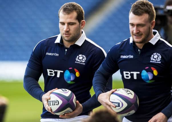 Fraser Brown, left, takes part in training at BT Murrayfield with Warriors team-mate Stuart Hogg. Picture: SNS