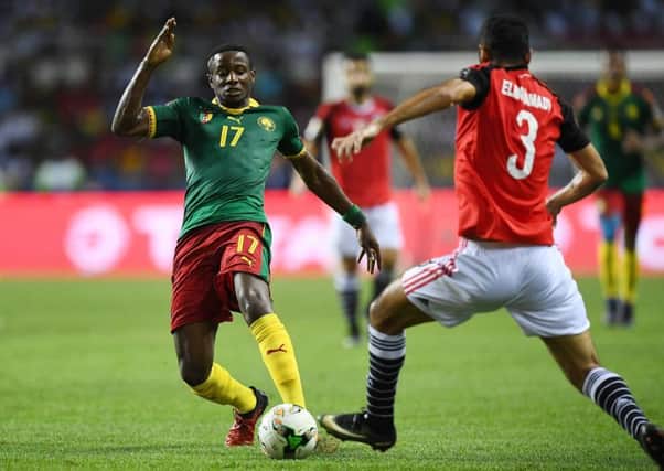 Cameroon  midfielder Arnaud Djoum vies for the ball against Egypt's midfielder Ahmed Elmohamady. Picture: AFP PHOTO / GABRIEL BOUYS/AFP/Getty Images
