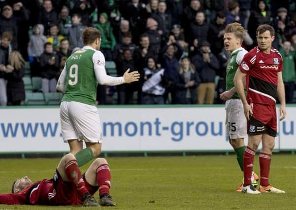 Jason Cummings, far right, celebrates after he equalised for Hibs against Raith Rovers. The Hibees, however, could not find the winner. Pic: SNS