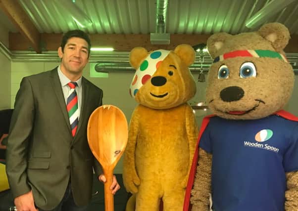 Former Scotland rugby player Nathan Hines opens the sensory room run by Bonnyrigg charity Bright Sparks which was made possible by Wooden Spoon funding.