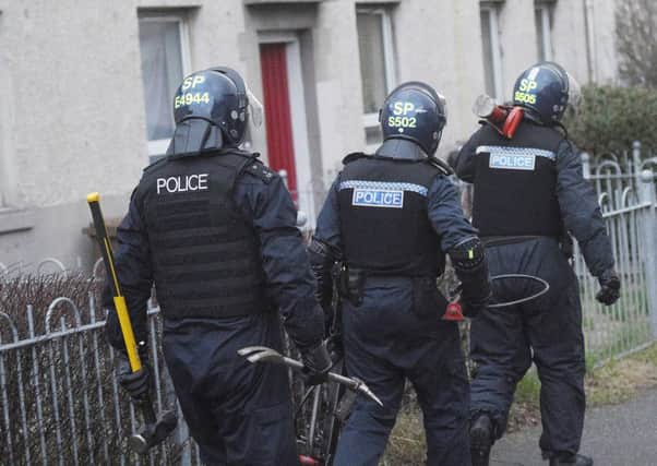 A series of dawn raids have been carried out across the Capital as part of Operation Eagle. Picture; Greg Macvean