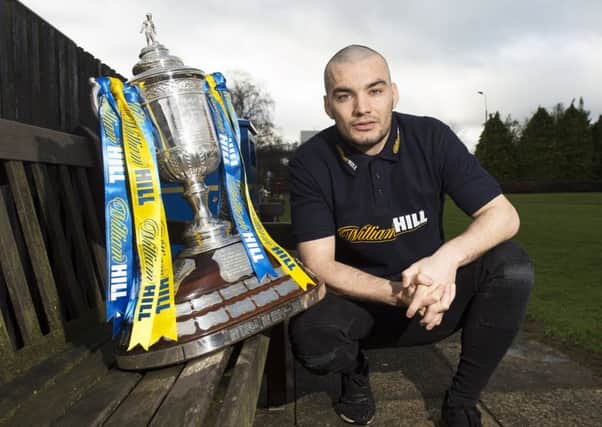 Tony Watt was almost unrecognisable from his recent time at Hearts as he travelled back north to promote the Hearts v Hibs William Scottish Cup fifth-round tie at Tynecastle on Sunday. Pic: SNS