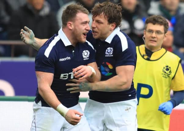 PARIS, FRANCE - FEBRUARY 12:  Stuart Hogg (L) of Scotland is congratulated by teammate Hamish Watson (R) after scoring the opening try during the RBS Six Nations match between France and Scotland at Stade de France on February 12, 2017 in Paris, France.  (Photo by Richard Heathcote/Getty Images)