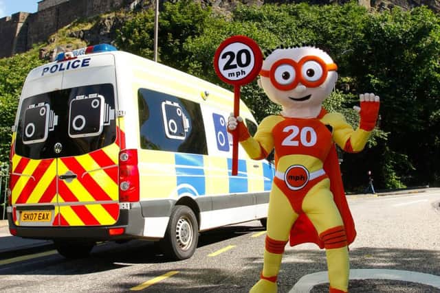 Edinburgh City Council superhero The Reducer promotes the 20mph zone message. Picture: Scott Louden