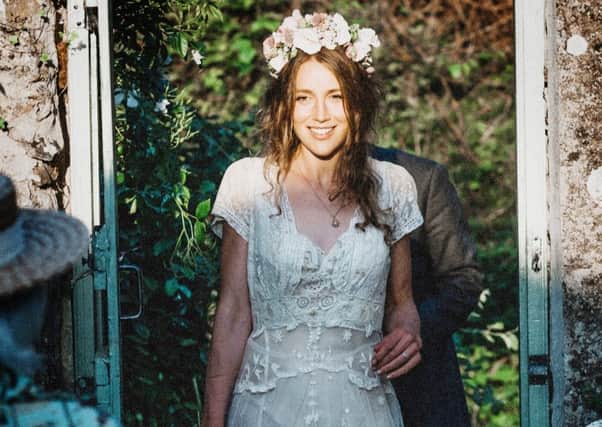 Tess Newall in her wedding dress also worn by her great great grandmother. Picture: Seth Baines Photo