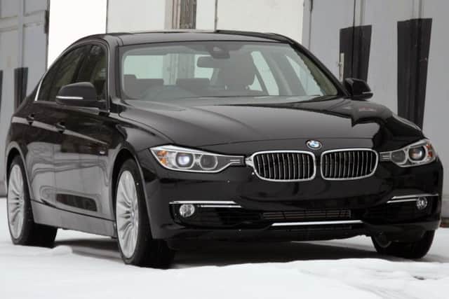 A black BMW car similar to this was found abandoned at the scene. Picture: Contributed