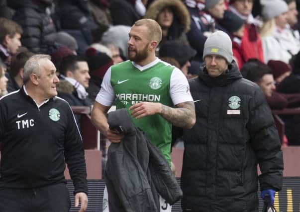 Hibs defender Jordon Forster, above, had to be replaced by Liam Fontaine at Tynecastle