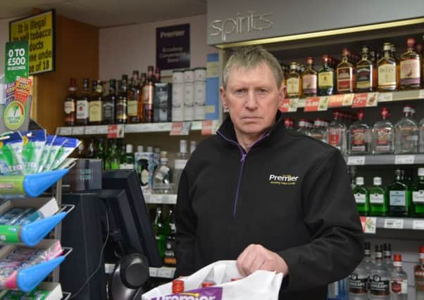 Dennis Williams was behind the counter when the theives struck. Picture: Jon Savage