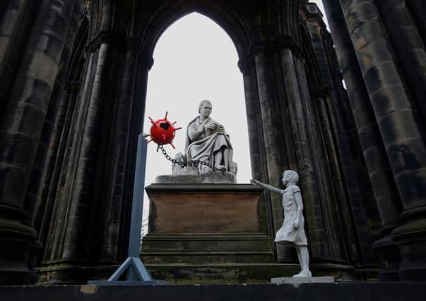 This mysterious statue in the style of famous street artist Banksy has appeared at one of Scotland's most famous monuments.