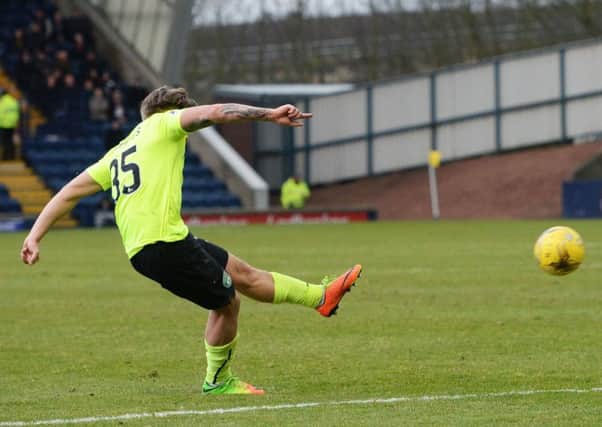 Jason Cummings scores from a free-kick, his 16th goal of the season rescuing a point for Hibs