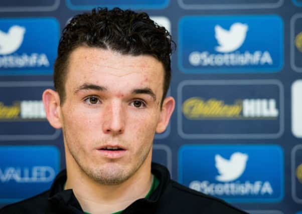John McGinn says boss Neil Lennon, above, dished out a far more ferocious attack on the Hibs players in the dressing-room than with the media. Pic: SNS