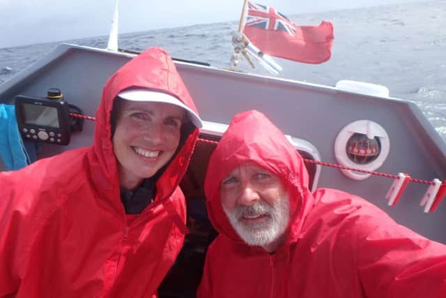 Fenella McAlister and Martin Cruickshank on-board the rowing boat in the Atlantic. Picture; SWNS