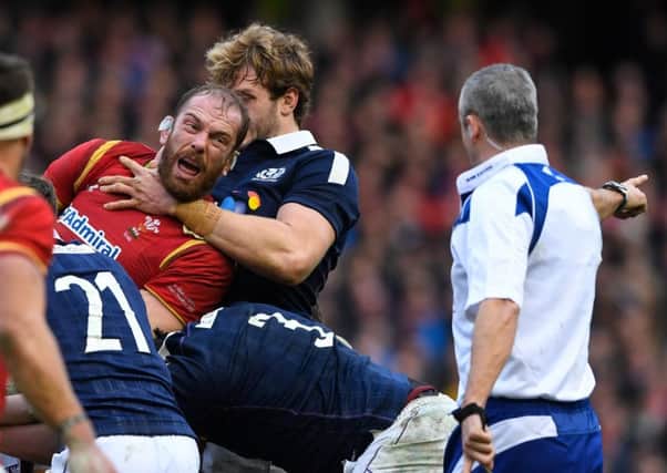 EDINBURGH, SCOTLAND - FEBRUARY 25:  Alun Wyn Jones of Wales and Richie Gray of Scotland grapple during the RBS Six Nations match between Scotland and Wales at Murrayfield Stadium on February 25, 2017 in Edinburgh, Scotland.  (Photo by Stu Forster/Getty Images)