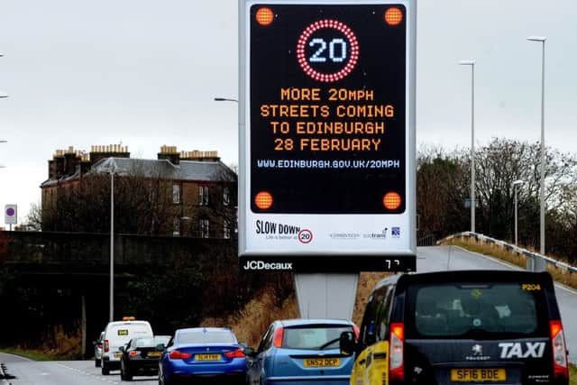 A sign telling Edinburgh drivers that more 20mph streets will be introduced on 28th Feb 2017. Picture; Lisa Ferguson
