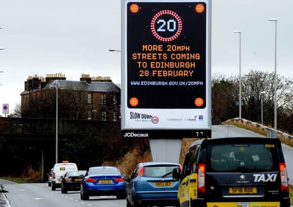 A sign telling Edinburgh drivers that more 20mph streets will be introduced on 28th Feb 2017. Picture; Lisa Ferguson