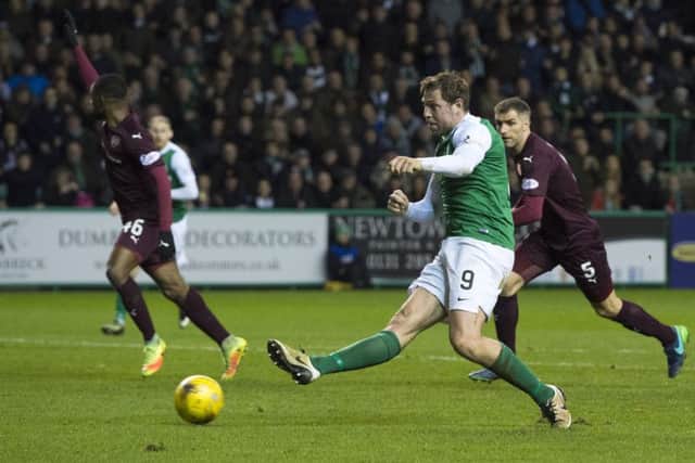 Grant Holt scores his side's second goal