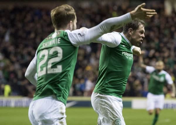 Grant Holt, right, celebrates scoring for Hibs against Hearts. Pic: SNS