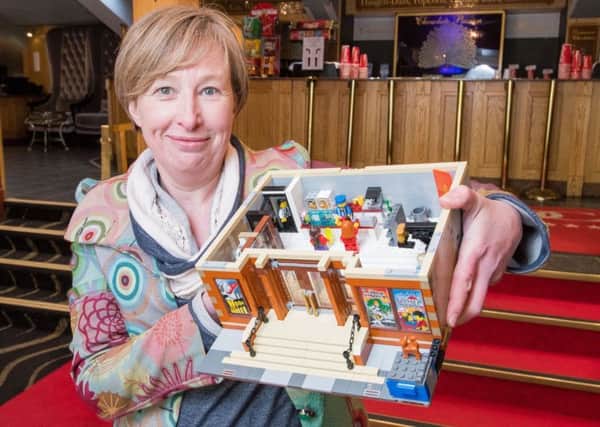 Tammy Watchorn who has built the Dominion Cinema out of Lego. Picture: Ian Georgeson.