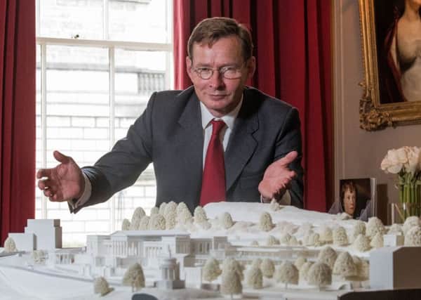William Gray Muir with a model of the proposed Music School at the Royal High School. Picture: Ian Georgeson