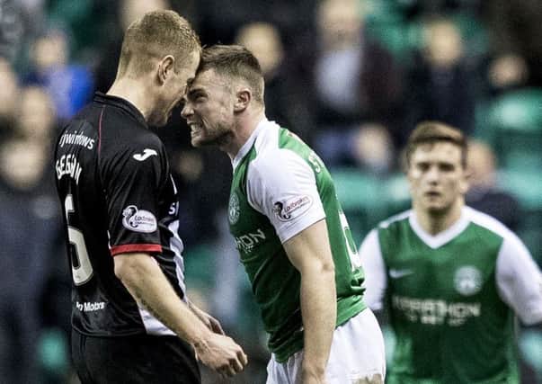 Lewis Stevenson clashes with Dunfermline's Andy Geggan