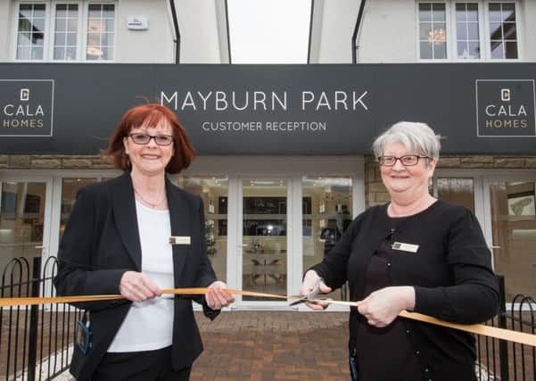Yvonne Flockhart (right) and Janette Mackay,  the sales advisors at CALA Homes' new development, Mayburn Park. Photo: Ian Georgeson