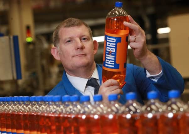 AG Barr boss Roger White said the group will be cutting the sugar content of its flagship Irn-Bru brand. Picture: Stewart Attwood