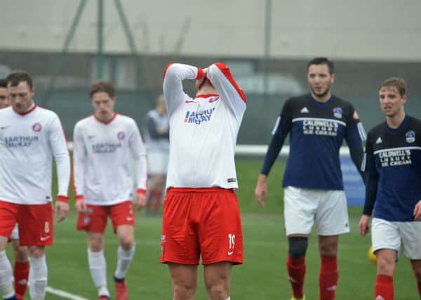 Chris Townsley shows his frustration as a chance goes begging for Spartans. Pic: Jon Savage