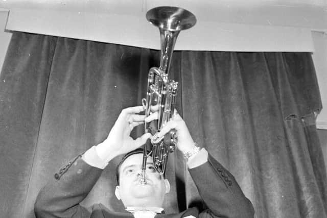Eddie Calvert plays his trumpet backstage at the Empire Theatre Edinburgh in 1958