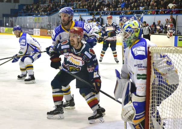 Capitals Matt Tipoff, waiting for the pass, gets close attention from Fife's Phillipe Paquet. Pic: Jan Orkisz/SMP