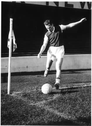 Lawrie Reilly scored the first goal for Hibs as he tangled with the Dundee custodian