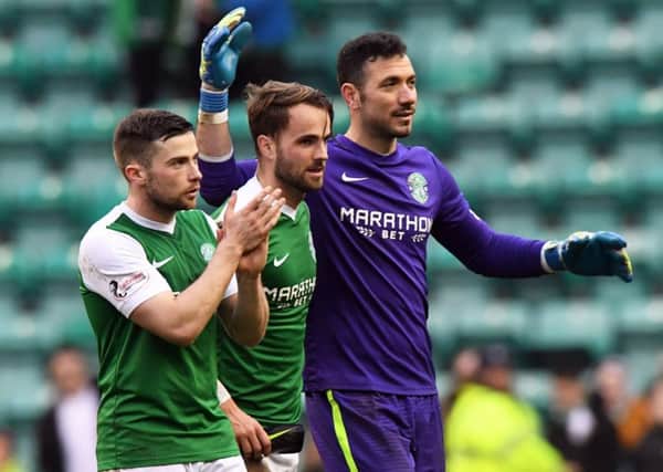 Ofir Marciano, right, celebrates Hibs' win over Ayr with Lewis Stevenson, left, and Andrew Shinnie