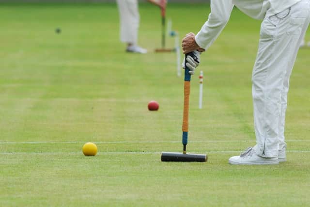 Croquet - the sport of choice for smug blokes on child-free holidays. Picture: Neil Hanna