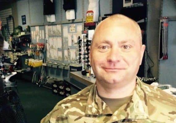 Keith McIlraith was photographed sneaking a look up a fellow police reservist's dress at an Oktoberfest party night at the No 603 Squadron headquarters in Edinburgh.