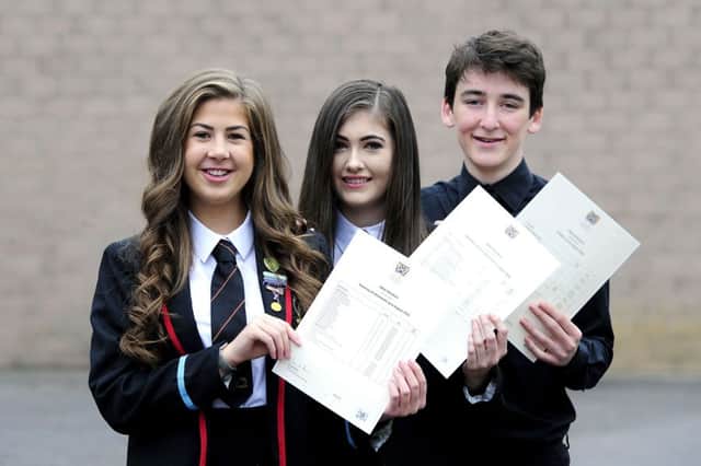 Pupils from Bo'ness Academy celebrate their Higher exam results in 2016. A record number of school leavers are now going on to further education. Picture: Michael Gillen