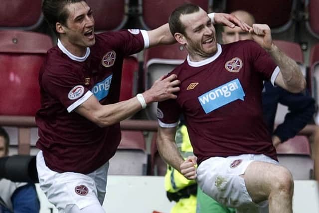 18/03/11 CLYDESDALE BANK PREMIER LEAGUE
HEARTS v HIBERNIAN (2-0)
TYNECASTLE - EDINBURGH
Hearts' Craig Beattie (right) celebrates his goal with team mate Rudi Skacel.