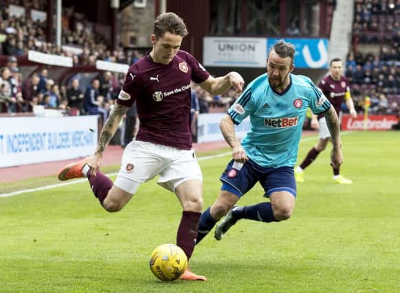Hearts' Sam Nicholson gave Hamilton left wing-back Dougie Imrie a wretched time at Tynecastle. Pic: SNS