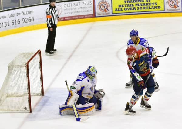 Ian Schultz executes a neat little flick of the puck over the Fife goaltender's stick to score. Picture: Jan Orkisz/SMP