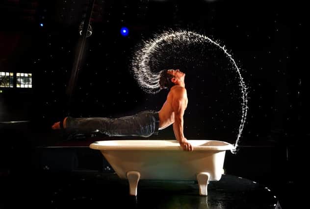 David O'Mer - the man in the bath from the memorable debut of La Clique in The Famous Spiegeltent in 2004


Festival 2004: La Clique -A Sideshow Burlesque, The Famous Spiegeltent.
David O'Mer, a shooting star in the world of German vaudeville performs his acrobatic act over and in a bathtub.
Pic.... Neil Hanna
Edinburgh Festival
2004
Arts