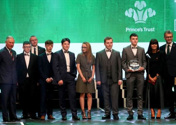 The Prince of Wales (left) on stage with the winners of the Dell EMC Community Impact award Leith Academy with Claudia Winkleman (2nd right) and Hugh Dennis (right). Picture; PA
