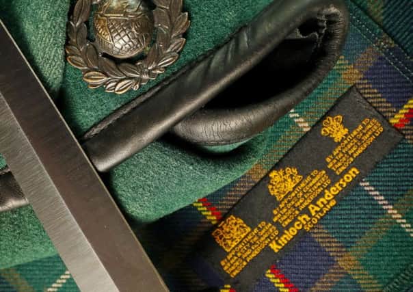 The official tartan for the 43 Commando Fleet Protection Group, which has been designed by Edinburgh-based Kinloch Anderson. Picture: LPhot Will Haigh/Royal Navy
