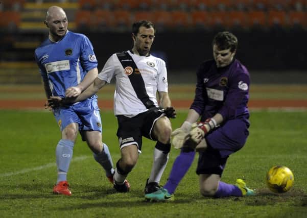 Dougie Gair stabs home against Berwick on Wednesday. Picture: Neil Hanna