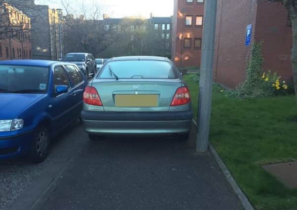 Drivers parking illegally in a private residents cap park, mostly parking on the pavement