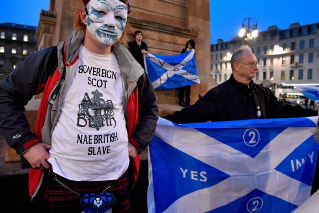 Independence supporters gather in Glasgows George Square Photograph: Jeff J Mitchell/Getty
