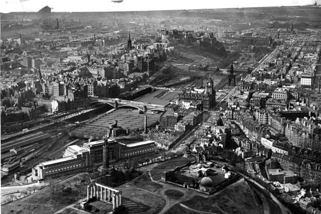 Aerial views of Edinburgh

Aerial view of Princes Street.

Calton Hill in foreground
St Andrew's House
Waverley Station
Edinburgh Castle