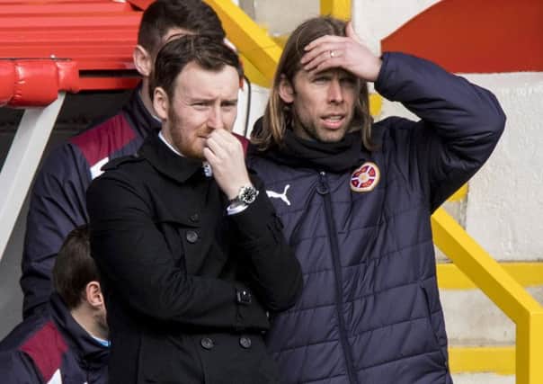 Hearts head coach Ian Cathro and assistant Austin MacPhee at Pittodrie