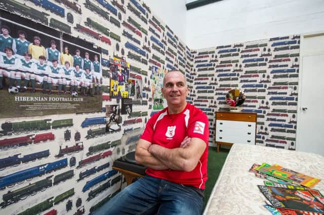 Davie Bain, director of Calton Athletic, in Renton's bedroom. More than 300 items from T2 Trainspotting will go under the hammer to raise money for two charities, including Calton. Picture: John Devlin/TSPL