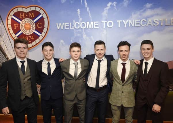 Hearts academy graduates, from left, Euan Henderson, Anthony McDonald, Connor Smith, Dean Ritchie, Christopher Hamilton and Jay Sandison. Harry Cochrane and Marc Leonard were absent from the photo shoot. Picture: Ian Georgeson