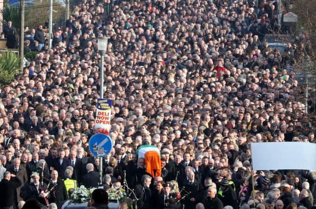 The coffin of Martin McGuinness is carried through the Bogside area of Derry, for burial. Picture: AFP