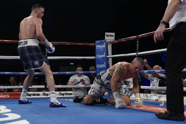 Taylor knocked down Joubert in the sixth round, ending the fight
