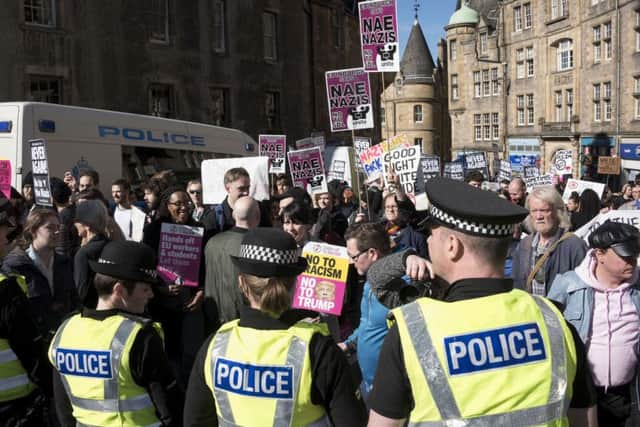 Police say there were around 40 White Pride demonstrators compared with around 400 anti-fascism protesters. Picture: Andrew O'Brien